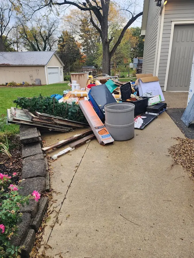 Dumpster being loaded with debris for Demolition Dumpster Rental in Gig Harbor